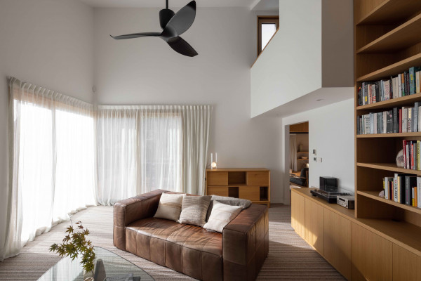 An absolutely stunning interior with the architecture showcased by a charming neutral, Resene Half Black White.  