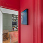 Interior feature walls painted in vibrant Resene Pohutukawa