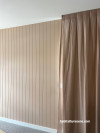 Master bedroom feature wall painted in Resene Shabby Chic with ceiling in Resene Quarter Rice Cake