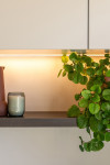 Warm neutrals and blush hues bring this Oratia home to life