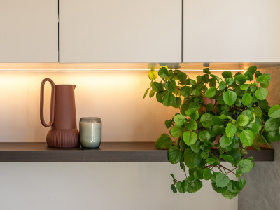 Warm neutrals and blush hues bring this Oratia home to life