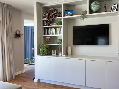 Warm neutrals and blush hues bring this Oratia home to life