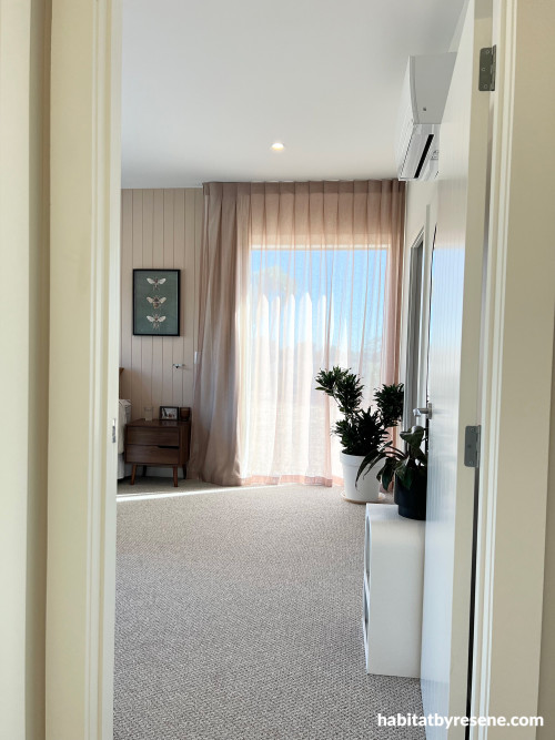 Master bedroom with walls painted in Resene Shabby Chic and ceiling in Resene Quarter Rice Cake