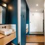 Bathroom featuring chic deep blue Resene Atomic