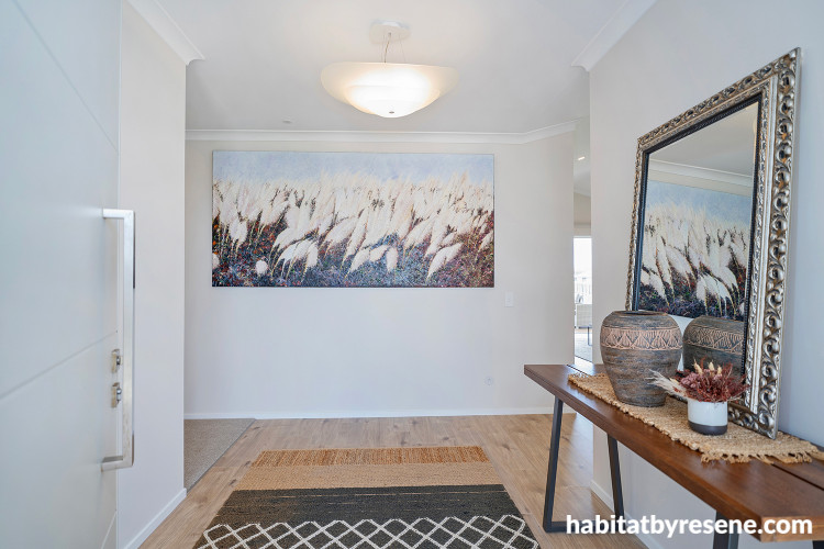 Entryway painted in light mother of pearl beige Resene Quarter Sandspit Brown