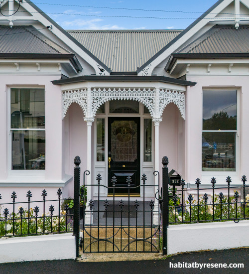 Villa home exterior painted in pale pink Resene Sauvignon