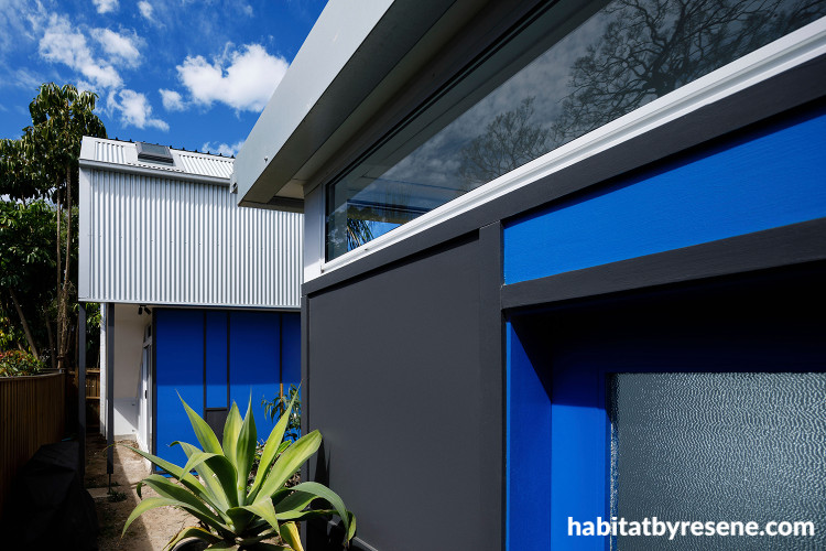 Exterior painted in Resene Wet N Wild and Resene Baltic Sea