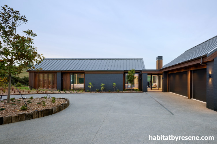 House exterior by Signature Homes featuring brickwork in Resene Bokara Grey