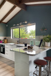An 80s-build gets a colour injection with Resene Indian Ink and Resene Green Meets Blue in an interior designer’s own home