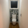 Powder room, powder room featuring wallpaper feature wall