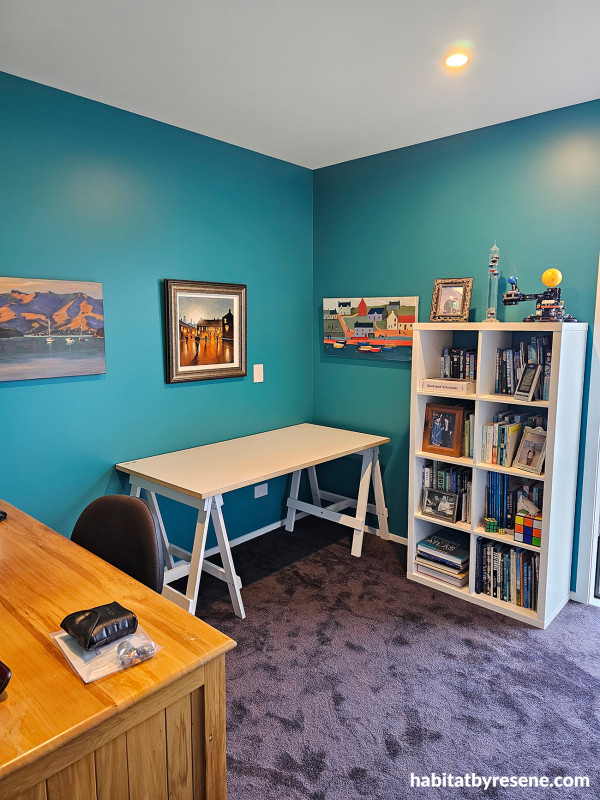 Hybrid work office that can double as a bedroom featuring vivid blue Resene Elm.