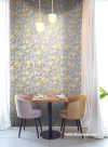 Dining room featuring subtle fruit-floral Resene wallpaper