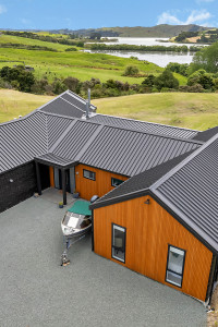 Charming colour, bold wallpaper and rolling hills in Kaiwaka