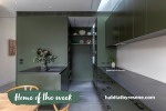 A dark green kitchen