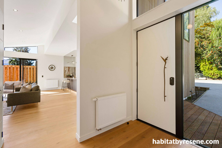 Entranceway featuring neutral walls