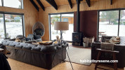 Living area, living area featuring a natural wooden interior with Resene Black trusses