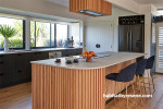 Kitchen with natural wood and white walls