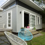 small home, house exterior, painted timber weatherboards, black and grey, grey and white