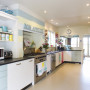 kitchen, colourful kitchen, pink blackboard, painted stripes, blue and pink, family kitchen