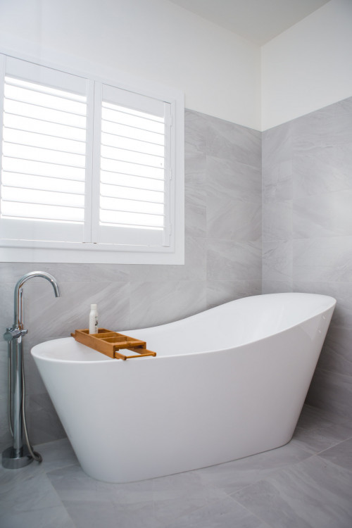 bathroom, grey bathroom, white bathroom, grey bathroom tiles, freestanding bath, resene alabaster