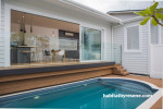 grey house, grey exterior, deck, outdoor living, swimming pool, resene athens grey