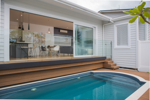 grey house, grey exterior, deck, outdoor living, swimming pool, resene athens grey