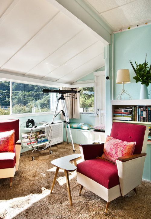 bach, holiday home, retro, turquoise paint, turquoise living room, lounge, raspberry chair