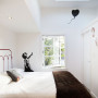 skylight, white bedroom, white paint, small home, white interior, banksy wall art