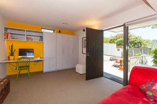 living area, lounge, yellow feature wall, white and yellow, renovated villa, yellow paint