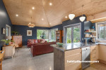 living room, kitchen, open plan living, blue living room, plywood ceilings, plywood interior