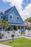 Dean and Delia’s delightful blue cottage by the sea