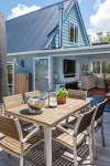 Dean and Delia’s delightful blue cottage by the sea