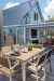 Dean and Delia’s delightful blue cottage by the sea
