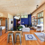painted lockwood, lockwood interior, blue lockwood, blue feature wall, blue living area