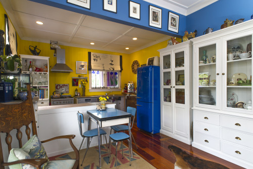 yellow kitchen, blue and yellow paint, blue dining room, blue fridge, bright kitchen