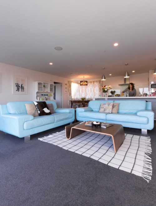 living room, lounge, open-plan, white paint, grey carpet, blue leather sofa
