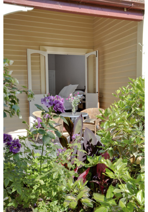 villa, renovation, garden, painted weatherboards, house exterior, yellow exterior, neutrals