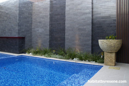 swimming pool, outdoor pool, exterior, water feature, grey wall, grey tiles