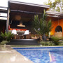 swimming pool, pavilion, exterior, orange paint, black paint, charcoal paint, contemporary garden
