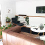 white lounge, white living room, neutral lounge, indoor plants, rimu mantel, renovated lounge