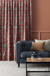 lounge, living room, orange living room, brown lounge, terracotta painted wall, patterned curtains