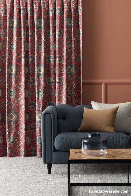 lounge, living room, orange living room, brown lounge, terracotta painted wall, patterned curtains
