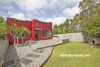 house exterior, red exterior, painted exterior, red paint, art deco home