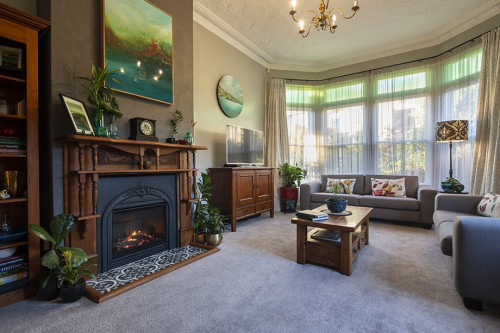 lounge, living room, fireplace, renovated interior, grey living room, grey lounge, brown lounge