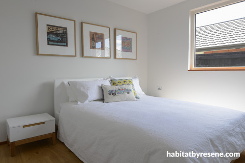 bedroom, white bedroom, eco-friendly home, Kiwiana prints, timber floors, white walls 