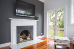 lounge, living room, fireplace, grey living room, grey feature wall, white and grey lounge