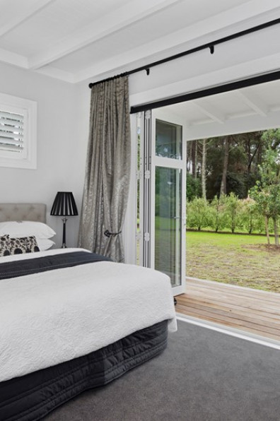 A classically-styled Matarangi bach makes the most of open-plan living