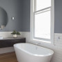 grey bathroom, resene raven, white subway tiles, matai, timber floors, freestanding bath