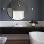 grey bathroom, resene raven, round mirror, white subway tiles, matai, timber floors