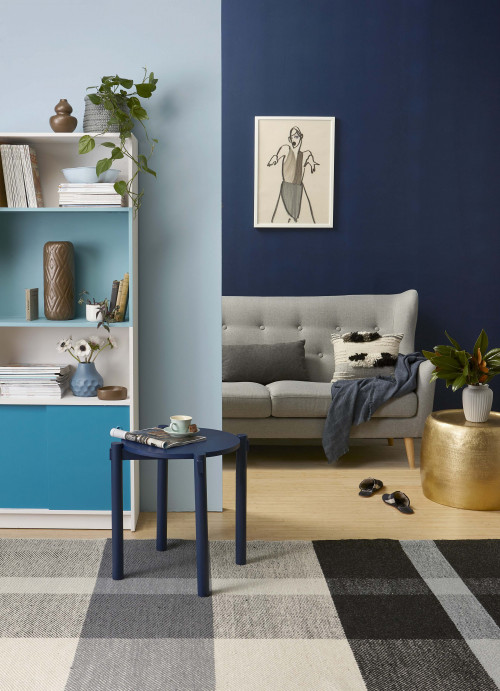 living room, lounge, blue living room, blue lounge, dark blue feature wall, timber floors